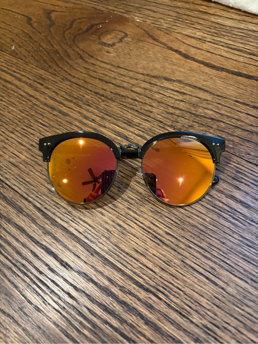 Round Black Frame Sunglasses with Orange Mirrored Lenses